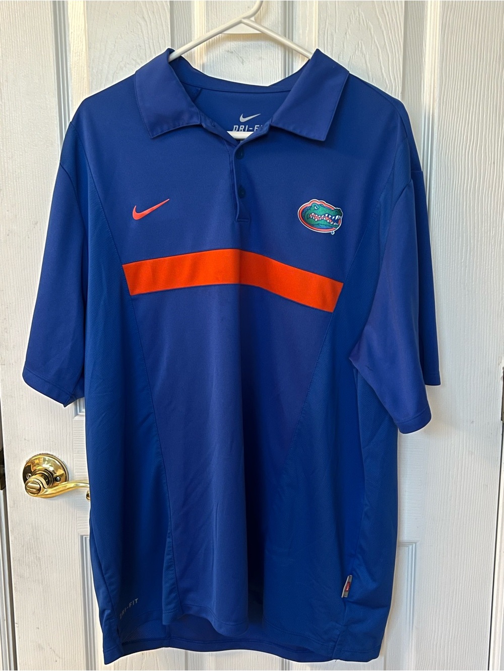 Nike Men’s Deep Blue Polo with Orange Stripe and Gators Patch